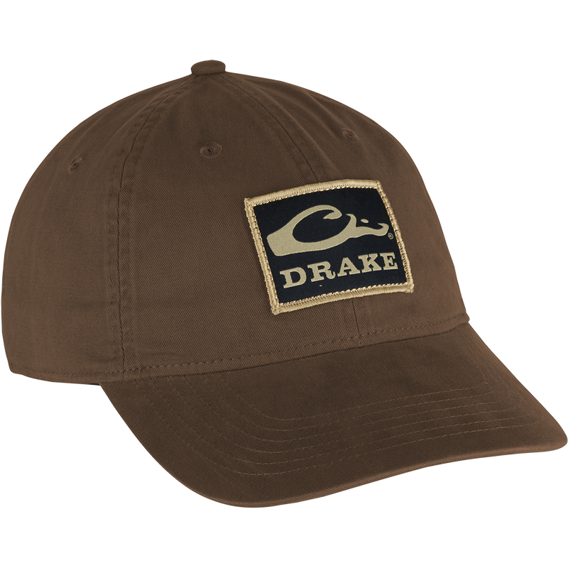 Cotton Twill Patch Cap with a low profile, contoured bill, and brass buckle back strap, embodying casual style suitable for outdoor and hunting enthusiasts.