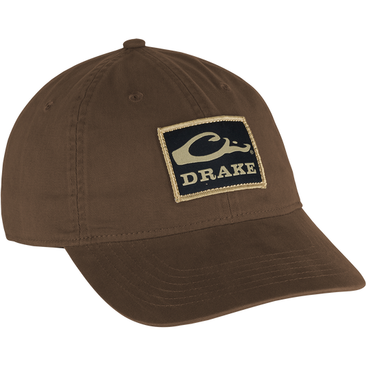 Cotton Twill Patch Cap with a low profile, contoured bill, and brass buckle back strap, embodying casual style suitable for outdoor and hunting enthusiasts.