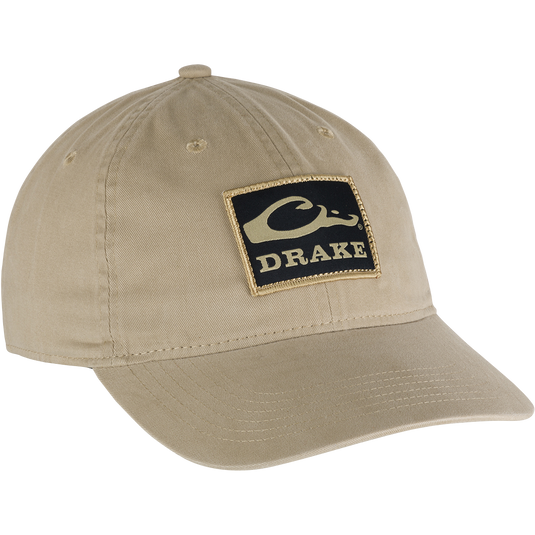 Cotton Twill Patch Cap with a low profile, contoured bill, and brass buckle back strap, made from 100% cotton twill.