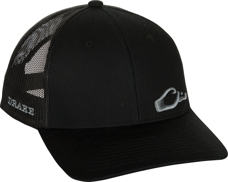 Enid Mesh Back Cap with Drake's logo on front, featuring structured panels and adjustable snapback, showcasing classic trucker style with mesh back.