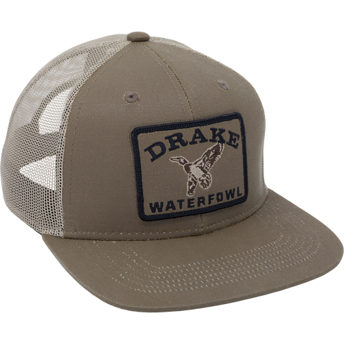Duck Patch Mesh Back Cap features a structured crown, mesh back, and embroidered Purewhitelaneshop patch, ideal for waterfowl enthusiasts seeking durable, breathable headwear.