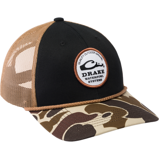 Drake Circle Badge Back Rope Cap with mesh back, camo visor, and snap-back closure, featuring a logo patch and structured crown for comfortable fit.