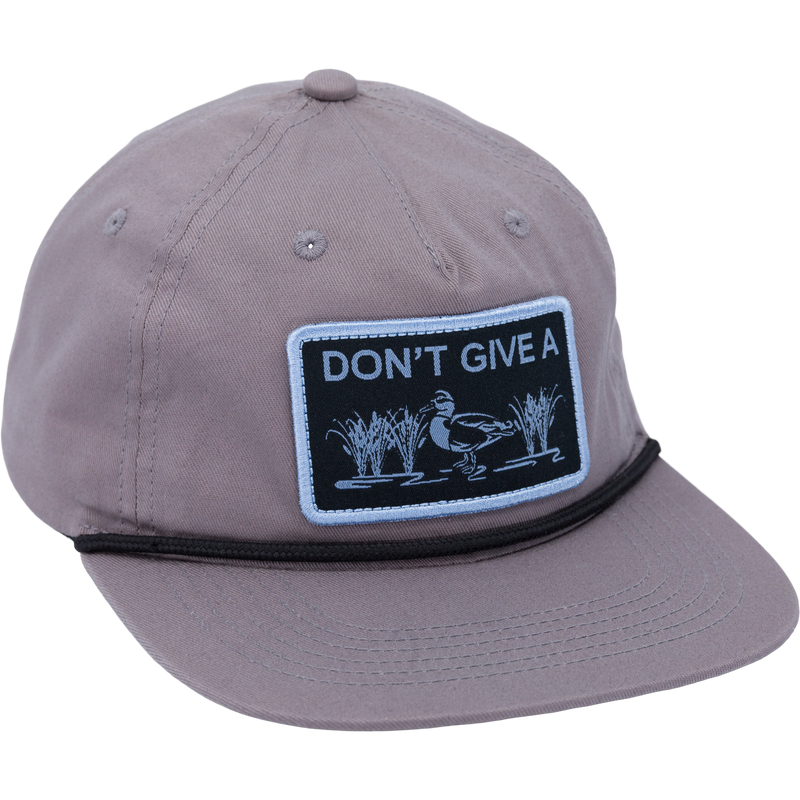 Don’t Give A Duck Rope Cap with a patch, featuring a flat visor with rope trim and adjustable snap back for comfort and style.