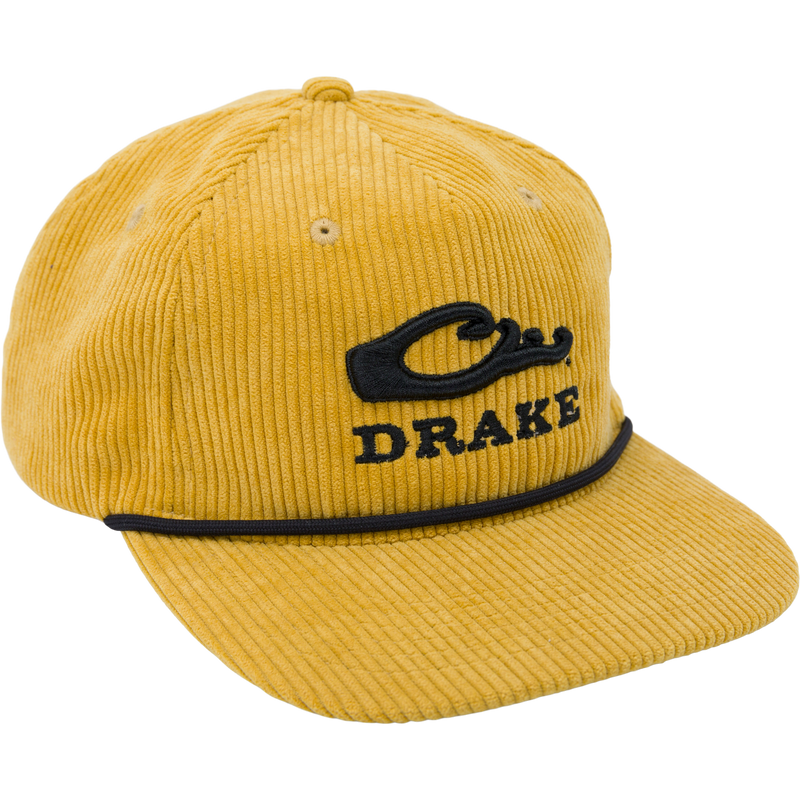 Drake X Lost Hat 3D Goat Rope Cord Cap featuring a black logo on yellow corduroy with adjustable snap-back and flat visor design.