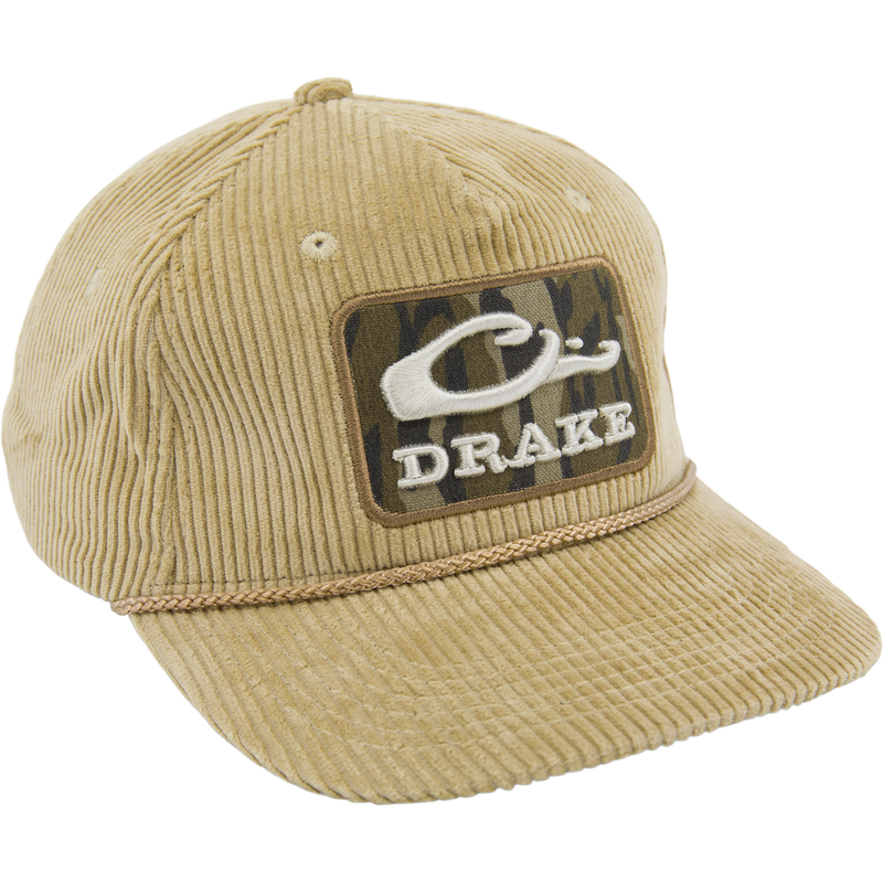 OG Bottomland Patch Cord Rope Hat in tan corduroy with camo patch and DRAKE script, featuring a braided cord above the brim for outdoor adventures.