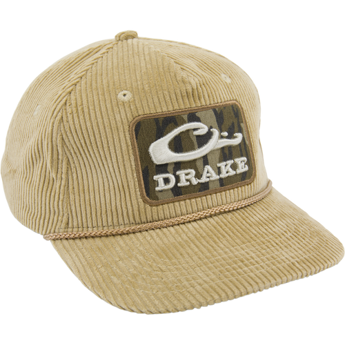 OG Bottomland Patch Cord Rope Hat in tan corduroy with camo patch and DRAKE script, featuring a braided cord above the brim for outdoor adventures.
