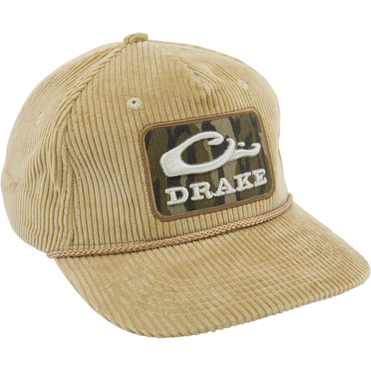 OG Bottomland Patch Cord Rope Hat in tan corduroy with camo patch and DRAKE script, featuring a braided cord above the brim for outdoor adventures.