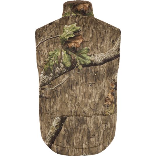 Back view of the Midweight Nova Silencer Vest with Agion Active X2, showcasing realistic tree bark and leaves camouflage pattern, designed for warmth, breathability, and hunting functionality.