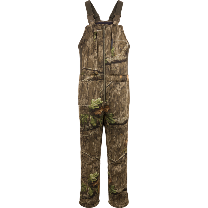 Midweight Nova Silencer Bib with Scent Control, featuring adjustable straps, front-center zipper, tree-bark camo, zippered chest pockets, designed for warmth, breathability, and silent outdoor activities.