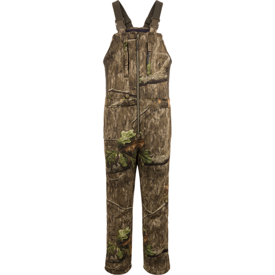 Midweight Nova Silencer Bib with Scent Control, featuring adjustable straps, front-center zipper, tree-bark camo, zippered chest pockets, designed for warmth, breathability, and silent outdoor activities.