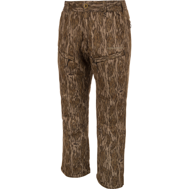 Midweight Nova Silencer Pant with Scent Control features brown camo pattern, multiple zippered pockets, and a stretch waistband for mobility and comfort.