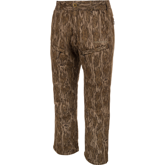 Midweight Nova Silencer Pant with Scent Control features brown camo pattern, multiple zippered pockets, and a stretch waistband for mobility and comfort.
