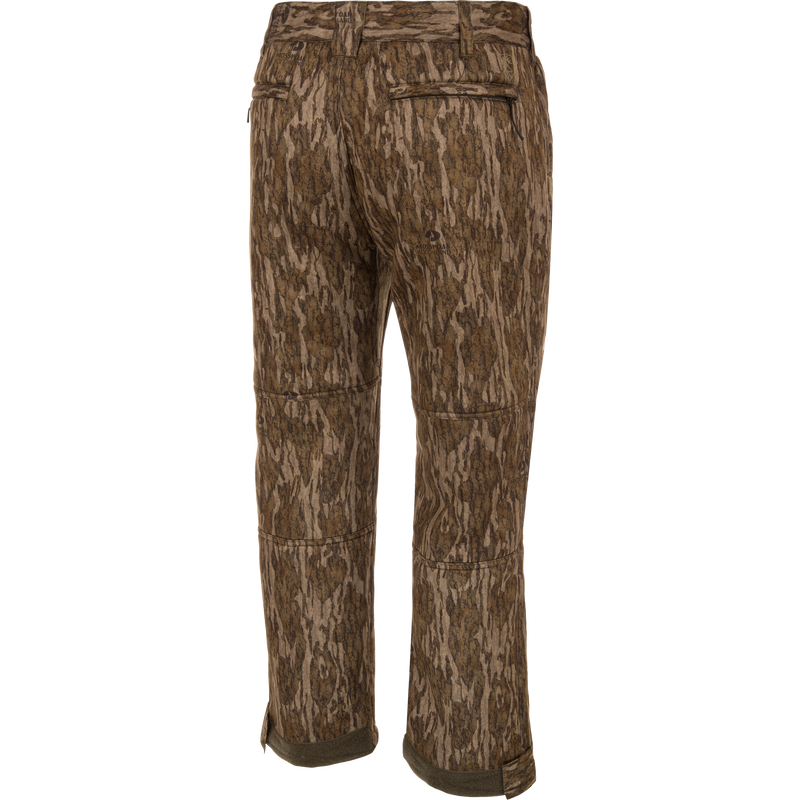 Midweight Nova Silencer Pant with Scent Control, featuring camouflage design, reinforced knees, adjustable hems, and rear pockets, ideal for hunting and outdoor activities.