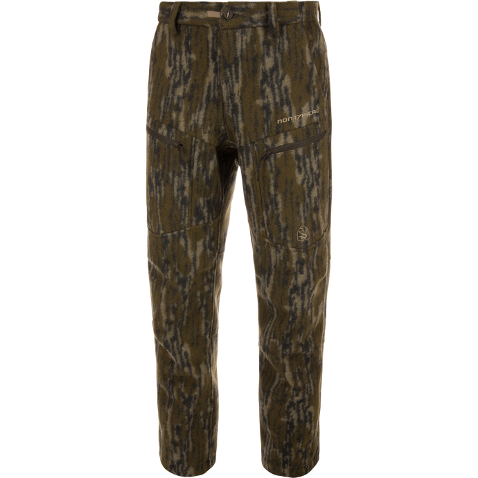 Midweight Hydrowool Softshell Pant with Scent Control, featuring camouflage pattern, zippered pockets, and buttoned waistband, ideal for hunting with windproof, waterproof, and anti-odor properties.