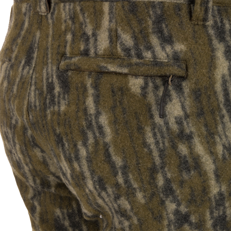 Midweight Hydrowool Softshell Pant with Scent Control, showing the rear welted pocket with zipper; ideal for hunting, featuring windproof, water-resistant, and anti-odor technologies.