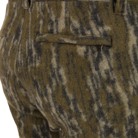 Midweight Hydrowool Softshell Pant with Scent Control, showing the rear welted pocket with zipper; ideal for hunting, featuring windproof, water-resistant, and anti-odor technologies.