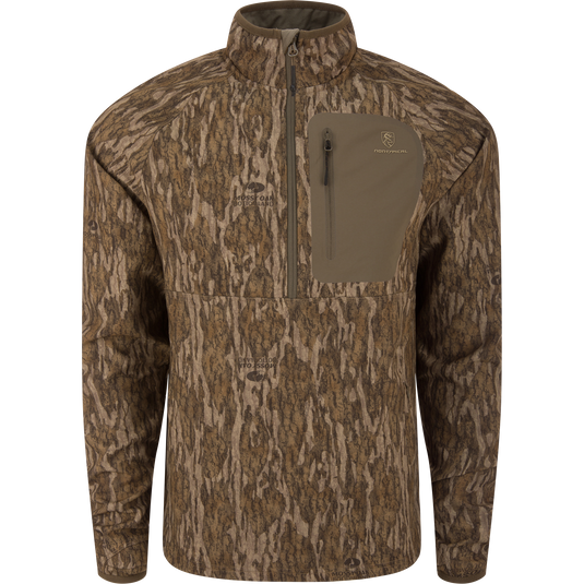 Non-Typical SWT Hybrid Half Zip with Scent Control, featuring a tree-bark camouflage pattern, zip-up collar, and zippered chest pocket, ideal for hunting with advanced moisture-wicking and odor control.