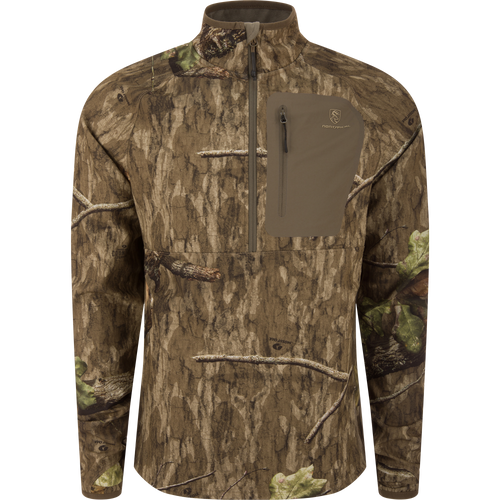 Non-Typical SWT Hybrid Half Zip with Scent Control features woodland camouflage, ergonomic thumbholes, and water-resistant pockets, ideal for hunting with breathability and odor protection.