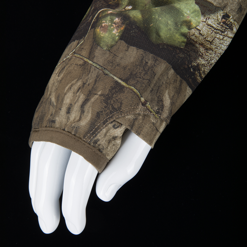 Non-Typical Lightweight SWT Half Zip Pullover with Scent Control on mannequin hand, showcasing camo pattern, thumb hole, and hemmed cuff for hunting and outdoor use.