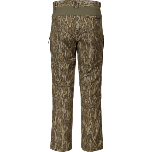 Back view of the Non-Typical Pant with Spider Web Technology in a tree-bark camouflage print, featuring a stretch waistband and knee pad compatibility for hunting comfort.