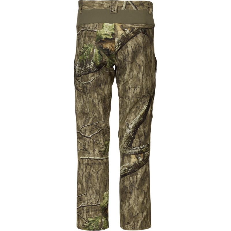 Rear view of Non-Typical Pant with Spider Web Technology, showcasing camouflage pattern and stretch waistband, designed for durability and comfort in hunting environments.