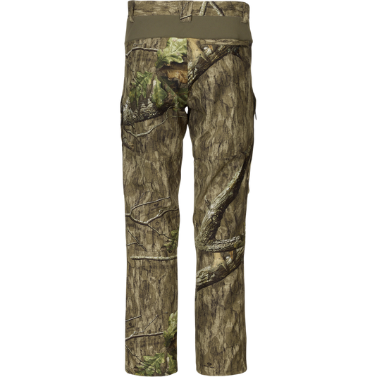 Rear view of Non-Typical Pant with Spider Web Technology, showcasing camouflage pattern and stretch waistband, designed for durability and comfort in hunting environments.