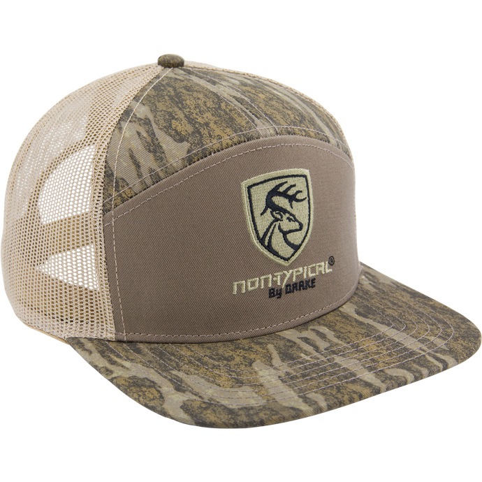 Camo-patterned trucker cap with flat brim, mesh back, and embroidered deer-head shield logo, labeled Non-Typical X Lost Sa7age 7 Panel Cap by Drake.