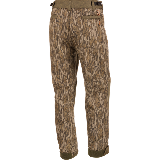 Alt text: Silencer Soft Shell Pant with Agion Active XL featuring camouflage pattern and multiple pockets for hunting.