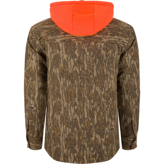 Non-Typical Campfire Hoodie with Mossy Oak camo, bright orange hood, and multiple pockets. Displayed on mannequin, showcasing functional hunting gear by Purewhitelaneshop.
