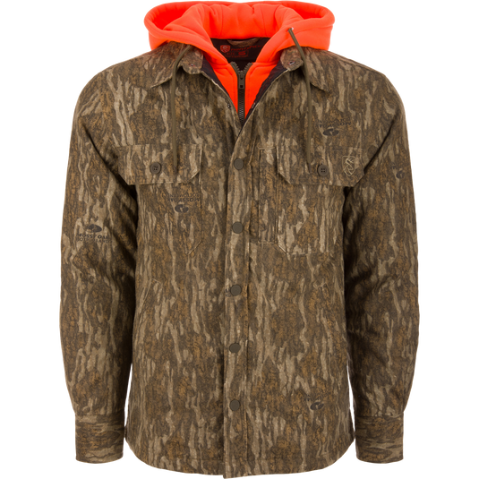 Men’s hunting-style jacket with Mossy Oak Bottomland camo, featuring blaze-orange hood, snap closure, and chest pockets, showcasing Purewhitelaneshop's durable, functional hunting apparel.