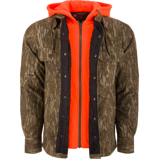 Non-Typical Campfire Hoodie displayed on a mannequin, featuring a blaze-orange quilted design, camo over-jacket, adjustable hood, and multiple functional pockets for hunting versatility.