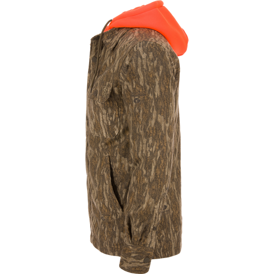 Non-Typical Campfire Hoodie with camouflage pattern, bright orange hood, chest and hand-warmer pockets, button cuffs, showcasing functional design ideal for hunting.