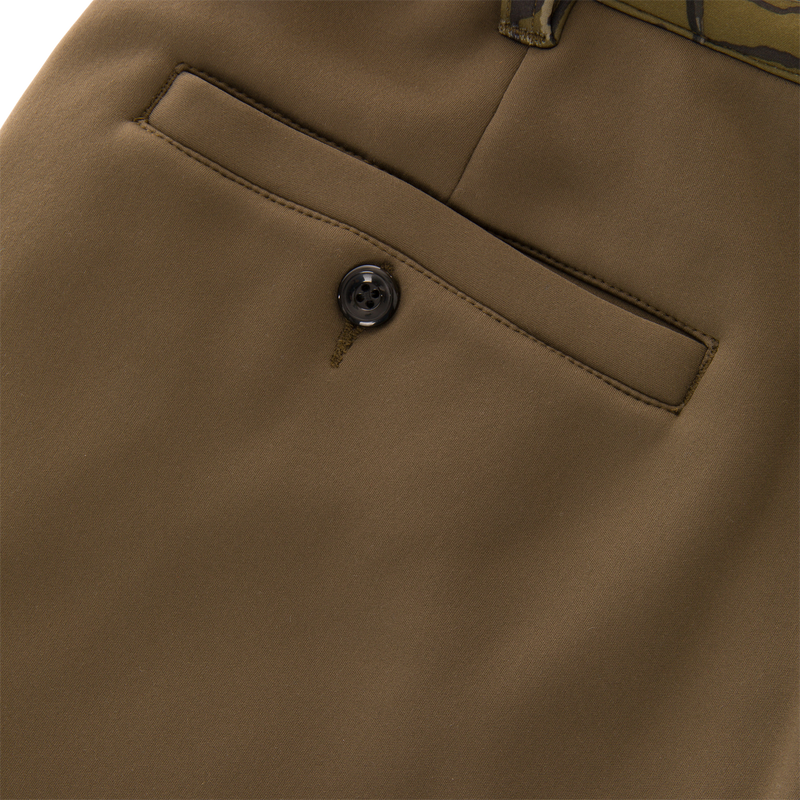 Close-up of Non-Typical Endurance Pant with Scent Control, highlighting the buttoned welt pocket and belt loop, showcasing durable design for hunting comfort and protection.