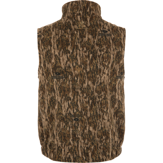 Non-Typical Windproof Layering Vest, showcasing a camouflage pattern, stand collar, elastic hem, and logo, designed for warmth and functionality with multiple zippered pockets.