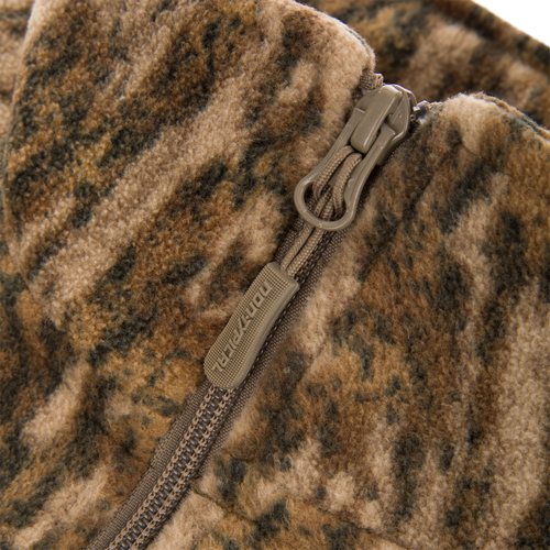 Non-Typical Windproof Layering Vest in camouflage fleece, featuring a matching zipper pull, designed for warmth and protection in outdoor activities.
