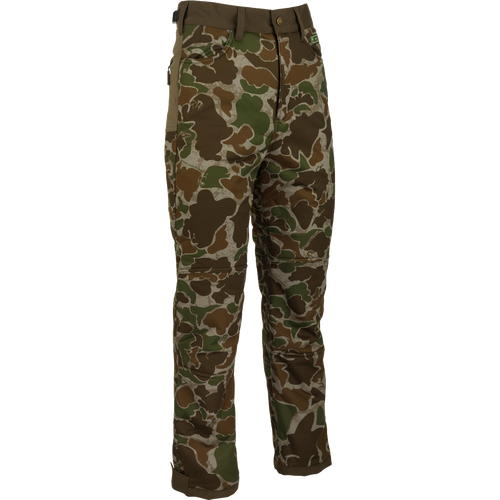 A pair of Standstill Windproof Pants with Agion Active XL® - perfect for late-season hunts. Soft, quiet, and durable fabric. Features scent control technology, adjustable waist, cuffs, and multiple pockets. High-quality hunting gear from Purewhitelaneshop.