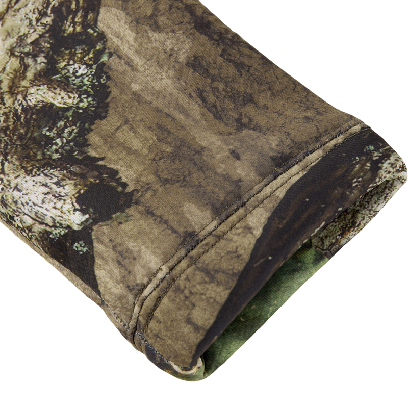 Close-up of the Non-Typical Silencer Hoodie sleeve, showcasing camouflage fabric and premium thermal-regulating material, designed for hunting with Agion Active X2 technology.