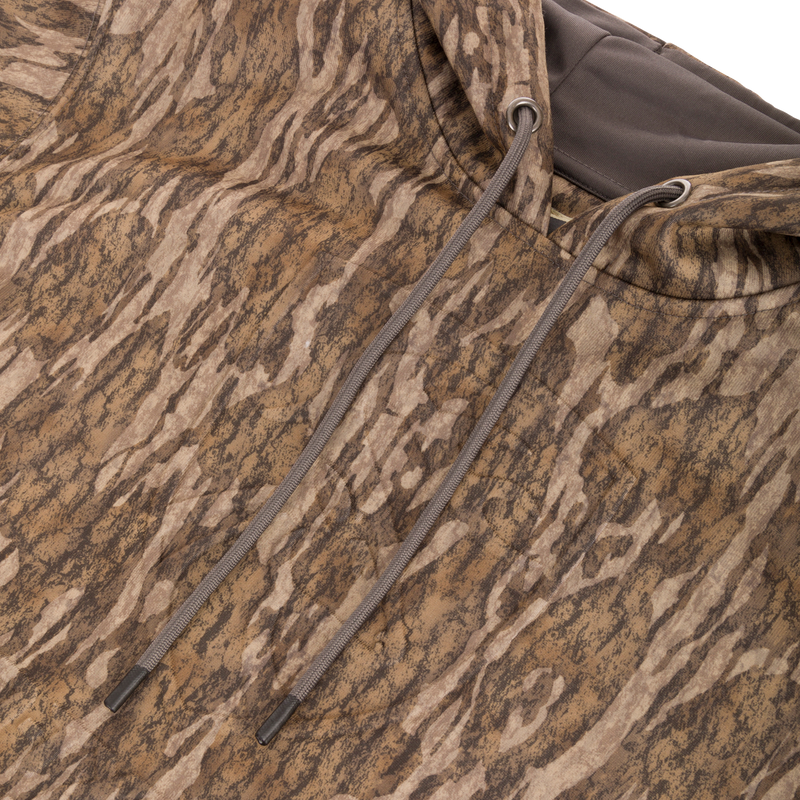 Close-up of the Non-Typical Back Eddy Embossed Hoodie showing the raised logo and adjustable drawstring hood.