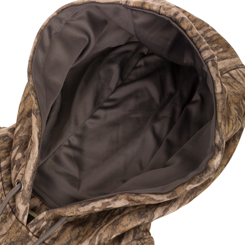 Close-up of Non-Typical Back Eddy Embossed Hoodie showing its zippered kangaroo pocket and adjustable drawstring hood, highlighting its detailed fabric texture.