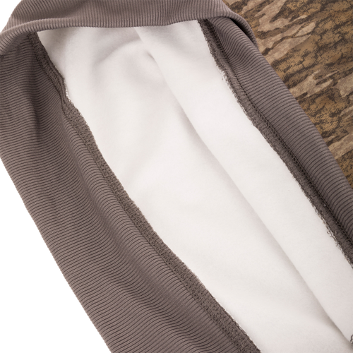 Alt text: Non-Typical Back Eddy Embossed Hoodie with raised logo, lined hood, and kangaroo pocket, ideal for hunting and cold weather.