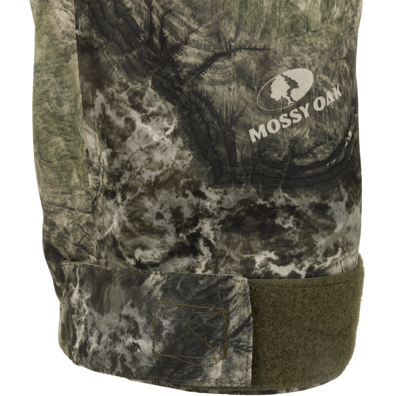 Endurance Jean Cut Pant with logo on camouflaged fabric, fleece lined, adjustable waist, and odor control technology.