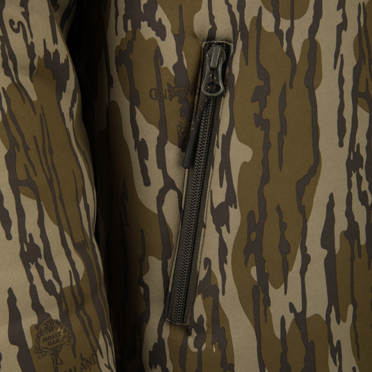 Non-Typical Silencer Full Zip Hoodie featuring a camo print with Midland logo and Mossy Oak emblem, showcasing a vertical zip pocket for hunting.