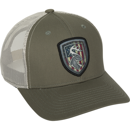 A cotton twill baseball cap with a patch featuring a deer logo. Mesh back for breathability. Adjustable snap closure.