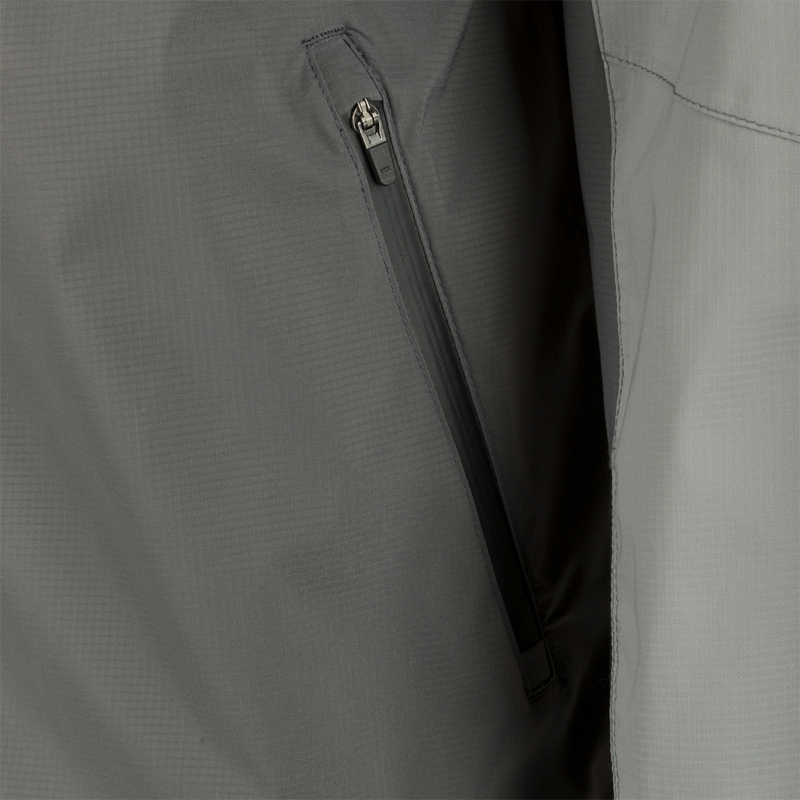 Close-up of the Ultra-Lite Backwaters Waterproof Stretch Jacket's center front zipper, highlighting its water-resistant Vislon design for optimal weather protection.
