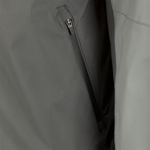 Close-up of the Ultra-Lite Backwaters Waterproof Stretch Jacket's center front zipper, highlighting its water-resistant Vislon design for optimal weather protection.