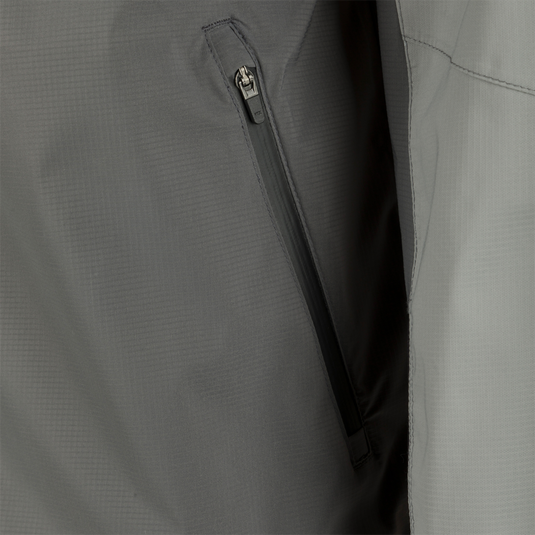 Close-up of the Ultra-Lite Backwaters Waterproof Stretch Jacket's center front zipper, highlighting its water-resistant Vislon design for optimal weather protection.