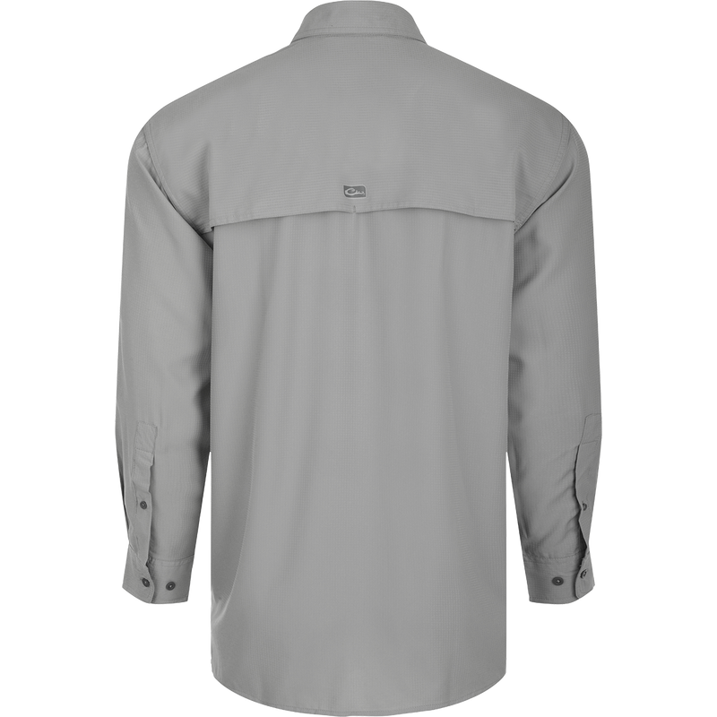 A lightweight, stretchy textured fabric shirt with a back view. Made from 100% polyester dobby fabric, it's breathable and moisture-wicking. Perfect for both field and dinner wear.