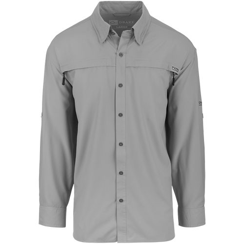A lightweight, stretchy textured fabric shirt with long sleeves. Made from 100% polyester dobby fabric, it's breathable and moisture-wicking. Perfect for both field and dinner outings. Features UPF 30 sun protection, vented cape back, mechanical stretch fabric, and 2 horizontal zipper pockets. Look sharp in the Town Lake L/S Shirt from Purewhitelaneshop.