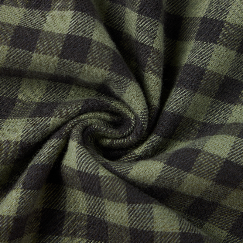 Autumn Flannel Shirt with olive-green and charcoal-black plaid pattern, featuring a soft, brushed-wool texture, ideal for outdoor enthusiasts seeking comfort and style.