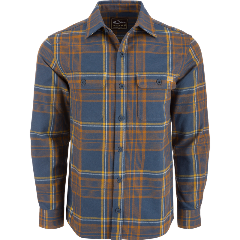 Legacy Flannel Plaid Shirt on mannequin, featuring button-front closure, two chest pockets, and button cuffs, ideal for layering in cool, outdoor settings.